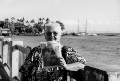 04-12-01-2
Jackie VanVoris of Mattapoisett poses with The Wanderer at Lahaina, Maui last month. A restored brig, the Carthaginia II, can be seen in the background marking the place where in 1819 a whaler out of New Bedford anchored and was the first in Hawaii to open greater trade with the islands. (Photo courtesy of Jackie VanVoris.) 4/12/01 edition
