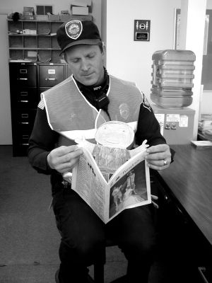 04-18-02-1
Officer Robert Small of the Rochester Police Department recently took a break from detail work to read the latest issue of The Wanderer with his new friend, Flat Stanley. Stanley is part of a nationwide school project in which these student creations are sent out to garner life experiences.  4/18/02 edition
