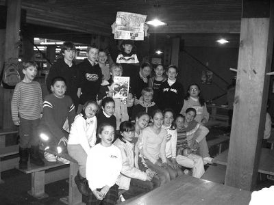 041504-5
Parents and mostly sixth grade children from Rochester went on a ski trip to Bretton Woods, NH recently and brought along a copy of The Wanderer and took some nice shots of the kids holding the tri-town newspaper up as a group after a spaghetti supper at the Bretton Woods Ski Lodge. (Photo by and courtesy of Peter Geldmacher). 4/15/04 edition
