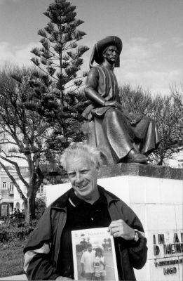 05-10-01-1
Charlie Tate of Mattapoisett poses in front of a statue honoring Prince Henry the Navigator in Sagres, Portugal during a recent trip. The site is a navigation school to which scientists, cartographers, astronomers, and explorers from all over Europe once flocked. This school and its students sparked the age of discovery which culminated with the discovery of the Americas and also a sea route to Asia. There is a similar statue dedicated to Prince Henry located in nearby Fall River. 05/10/01 edition
