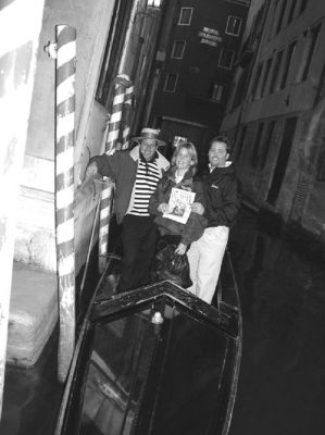05-23-02-2
David and Ann-Marie Francis were vacationing in Venice, Italy this past March and here they pose with a copy of The Wanderer as they are just about to embark on a ride around the canals of Venice in a gondola with our gondolier. Ah, Venice! 5/23/02 edition

