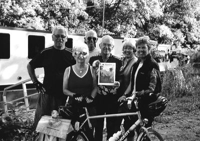 090403
During a bike/barge trip through the Burgundy region of France last month, this group of Wandering Wanderers traveled from Tournus to Besanon and remembered to pose with a copy of The Wanderer along the way. They include (l. to r.) Fred Rioles of Mattapoisett, Lois Rioles of Mattapoisett, Ed Scholter of Mattapoisett, Ray Lemieux of Mattapoisett, Betty Scholter of Mattapoisett, and Lorna Walker of Rochester. (Photo courtesy of Lorna Walker). 9/4/03 edition
