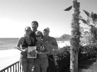 122304-4
During a trip last October to Cabo San Lucas, Mexico, Rene' Potkay of Fairhaven, Shawn Moniz of Fairhaven, and Mark and Melissa Manzone of Rochester took along a copy of The Wanderer with which they posed here near the scenic beachfront. 12/23/04 edtion
