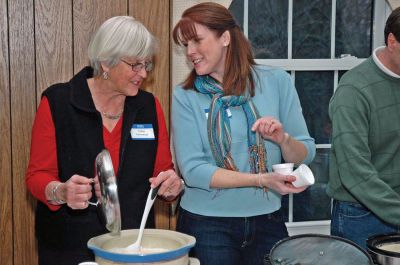 Chowder Championship
Tinker Saltonstall and Aimee Fox prepare the line-up of nine chowders at the Congregational Community Center in Marion on March 26, 2011, awaiting the votes from 56 attendees to select the "Chowder Champions". Photo courtesy of Warren Briggs.
