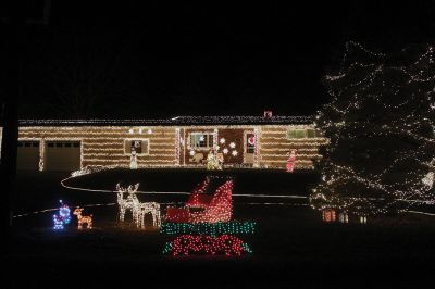 Christmas Lights 
Marino Carreiro submitted this photo of his house at 59 Acushnet Road. The house has up to 40,000 holiday lights this year, and passersby, he says, are welcome to sit on the sleigh to take pictures.
