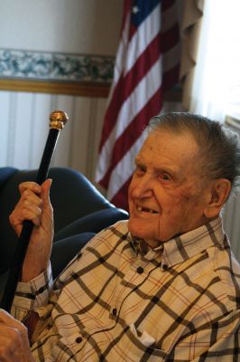 Boston Post Cane
Selectman Naida Parker presented Rochester’s oldest resident with the Boston Post Cane on February 20. Armand Cournoyer, 100, who now resides at the Sippican Healthcare Center, received the cane during a small ceremony while surrounded by friends and three generations of family members. Photos by Jean Perry
