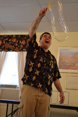 Mike the Bubble Man
Mike Dorval, aka Mike the Bubble Man, wowed Tri-Town children on June 23 with his exciting presentation on the science behind bubbles. The show kicked off the Plumb Library’s summer reading program, and the Rochester Cultural Council helped fund the event. Photos by Jean Perry
