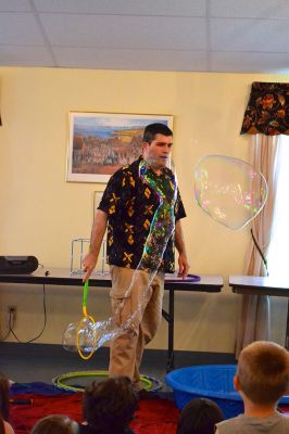 Mike the Bubble Man
Mike Dorval, aka Mike the Bubble Man, wowed Tri-Town children on June 23 with his exciting presentation on the science behind bubbles. The show kicked off the Plumb Library’s summer reading program, and the Rochester Cultural Council helped fund the event. Photos by Jean Perry
