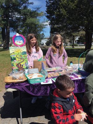 Junior Friends of Plumb Library
Abbie Jacques and Isabelle Jones, members of the Junior Friends of Plumb Library, sold baked goods on April 30 while the Friends sold used books. The monies help to support library programs. Photo by Marilou Newell
