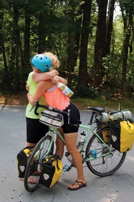 Homecoming Queens 
Colleen Oakes, originally from Marion, and Renee Buteyne, from Rochester, finished the trip of a lifetime on Monday, July 16, having ridden across the United States on their bicycles. Leaving Portland, Oregon on May 2, the two childhood friends arrived at Buteyne’s parents’ driveway about a month earlier than anticipated, greeted by family, friends, confetti, cookies, and of course, hugs. Photos by Jean Perry
