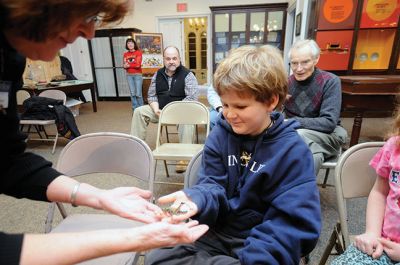 Bugworks
The Marion Natural History Museum provided an opportunity on February 27 to get up close and personal with critters from the insect world, including praying mantises and jumbo-sized grasshoppers. Above: Tapper Crete, 7, was the first one brave enough to ask to touch a praying mantis. The event was hosted by Maire Anne Diamond, owner and educator at ‘Bugworks.’ Photos by Felix Perez
