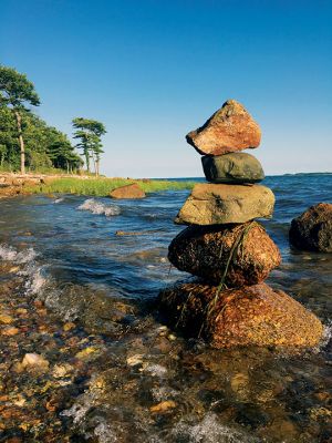 Cairns
Cairns have started cropping up again along the beach at the Nasketucket Bay State Reservation. The stacks of balanced rocks stand in and along the water’s edge, leaving behind the message to all others who pass, “I was here.” Photo by Jean Perry
