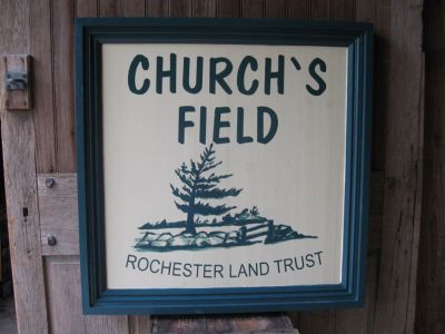 Church's Field
This new sign will welcome visitors to the 32-acre Church's Field, the newest property conserved by the Rochester Land Trust. The property will be dedicated in a ceremony on May 21, 2011 at 1:00 pm at Church's Field on Mattapoisett Road in Rochester. Photo courtesy of Laurene Gerrior.
