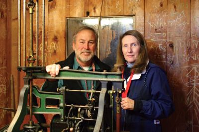 Center Clock Repair
Mattapoisett resident Ray Andrews, left, poses with Linda Balzer of Balzer Family Clock Works at the Center School clock tower on Thursday, December 1, 2011. The weight pendulum clock will be restored at the Blazer workshop in Freeport, ME, and then returned to the Center School in spring. Photo by Anne Kakley.
