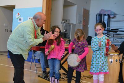 Manguito
Center School students were introduced to Latin rhythms and percussion instruments by the Boston-based educational Latin American music group Manguito during an afternoon presentation on January 24. Manguito members really captured the attention of the kids, resulting in plenty of learning while the group’s sizzling salsa and merengue music resulted in an eruption of dancing and spontaneous conga lines. Photo by Jean Perry
