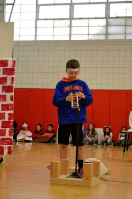 Destination Imagination
Two groups of students who participated in the Destination Imagination competition presented their award-winning performances in front of the school (top, right). The fifth grade team members – Griffin, Anthony, Caroline, Paige, and Julia – acted out their scientific challenge on extreme environments called “Popturians.”
