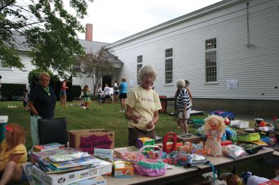 Summer Faire
Happy shoppers united at the Mattapoisett Congregational Churchs annual Summer Faire on July 31, 2010. The upscale yard sale offered great deals on nice furniture items and had a section of toys and games, just for the kids. Photo by Laura Pedulli.
