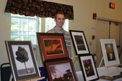 Art Show
Gary Lawrence displays his collection of fine art photography at the First Congregational Church of Rochester's first ever Fine Arts Cafe event on Saturday, September 25, 2010. A portion of the proceeds benefit the church's Steeple Fund. Photo by Laura Peduli
