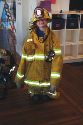 Fire Prevention
Mattapoisett YMCA preschool students celebrated Fire Safety Prevention Week with a visit from Acushnet fireman, Doug Braley. There will be a Fire Department open house on Thursday, October 13 from 6:00 to 8:00 at the Mattapoisett Fire Station on Route 6. Photo courtesy of Tricia Weaver.
