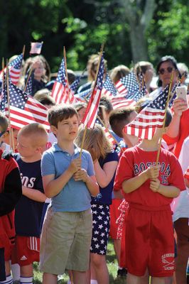 Flag Day
Center School students gathered together with Old Hammondtown students by the Center School flagpole on the morning of Tuesday, June 14, to celebrate Flag Day. The OHS band played a number of tunes, while the Center School students sang patriotic songs and listened to Principal Rose Bowman read a series of poems and writings to remind the children of what the American flag stands for. Afterwards, the third-graders treated the seniors to the school’s annual senior breakfast. Photos by Jean Perry
