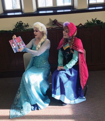 Frozen Princesses
On December 21, two princesses visited the Mattapoisett Public Library to read stories and sing songs from the Disney film Frozen. Princesses Elsa and Anna beguiled the children as well as their parents in an hour-long performance culminating in hugs and a photo session. The delightful event was sponsored by the Friends of the Mattapoisett Library. Photos by Marilou Newell
