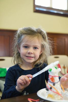 Gingerbread Houses
While others were out bustling on the last Saturday before Christmas, a couple dozen of the littler library patrons enjoyed the day making candy gingerbread houses at the Mattapoisett Free Public Library on Saturday, December 19.
