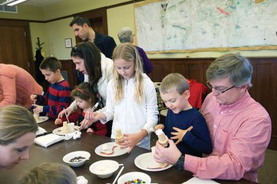 Gingerbread Houses
While others were out bustling on the last Saturday before Christmas, a couple dozen of the littler library patrons enjoyed the day making candy gingerbread houses at the Mattapoisett Free Public Library on Saturday, December 19.
