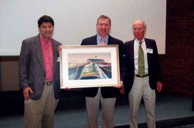 Painting Donation
James Russell, president of the New Bedford Whaling Museum (center) accepts painting from Mattapoisett watercolorist Mike Mazer (left) as Ian Marshall, president of the American Society of Marine Artists, (right) looks on. The painting was one of three donated to the New Bedford Whaling Museum by Dr. Mazer at the annual meeting of ASMA held recently at the Whaling Museum. Photo by Robert Semler, ASMA past president.

