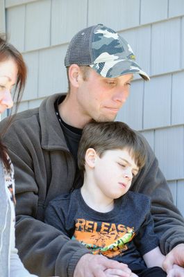 Habitat for Humanity Home
Christine and Josh Liggerio stand with their daughter Hailey, 9, and son Keagan, 6, on the porch of their new Habitat for Humanity home in Marion on March 19. The Liggerios celebrated the completion of their new Wareham Road home with Habitat for Humanity of Buzzard’s Bay executives, Representative Bill Straus, and a crowd of well-wishers during a dedication ceremony on Saturday. Photo by Felix Perez
