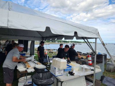 Harbor Days 
Cakes were on the griddle, and patriotism was in the air, as residents and visitors were greeted by the annual Harbor Days festival hosted by the Lions Club last weekend in Shipyard Park. Photo courtesy of the Mattapoisett Lions Club and Immediate Past King Lion Robert Haley
