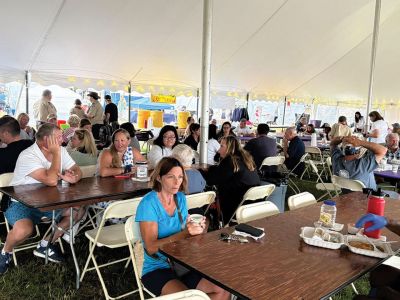 Harbor Days 
Cakes were on the griddle, and patriotism was in the air, as residents and visitors were greeted by the annual Harbor Days festival hosted by the Lions Club last weekend in Shipyard Park. Photo courtesy of the Mattapoisett Lions Club and Immediate Past King Lion Robert Haley
