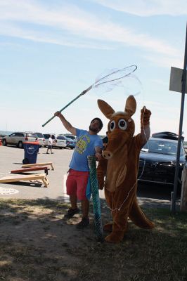 Harbor Days 
Harbor Days came to Mattapoisett this past weekend, and many visitors were gracious enough to spin The Wanderer Wheel for a $1 donation to the Lions Club. Those who played helped raise an extra $523 the Lions Club will use to benefit the community. The Aardvark came out too, but since furry aardvarks hate hot weather, he only made a couple of appearances. Photos by Jean Perry

