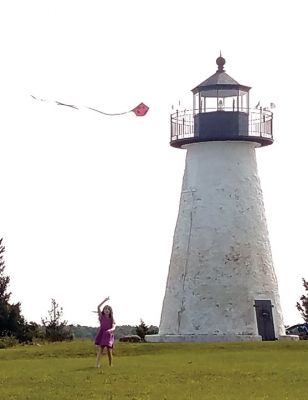 Ned’s Point
Ev flying a kite at the Ned’s Point light house. Photo courtesy Rebecca Harris
