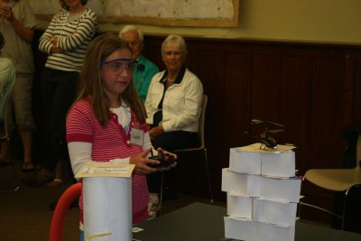 Extreme Engineering
On Tuesday, July 31, dozens of curious students gathered at the Mattapoisett Library to join Dr. Martin Hudis in his Extreme Engineering program.  The students participated in a variety of different exercises using remote controlled helicopters in a hands-on approach to learn valuable lessons in math and science.  The session was the last of four conducted by Dr. Hudis.  Photo by Katy Fitzpatrick.
