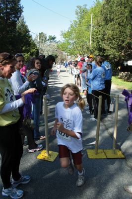 Mom's Run
Several hundred runners and walkers participated in the Tiara Classic Mother's Day 5k Race on Sunday morning, May 10 in Mattapoisett. The event, now in its third year raises funds and awareness for the Womens Fund of Southeastern Massachusetts while celebrating motherhood. Photo by Robert Chiarito.
