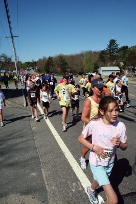 Run Mom Run
Several hundred runners and walkers participated in the Tiara Classic Mother's Day 5k Race on Sunday morning, May 10 in Mattapoisett. The event, now in its third year raises funds and awareness for the Womens Fund of Southeastern Massachusetts while celebrating motherhood. Photo by Robert Chiarito.
