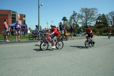 Bikes, Bikes, Bikes!
The Third Annual Pan Mass Challenge Kids Tri-Town Ride attracted several hundred young bicyclist to the ORR campus on Saturday morning, May 16, for a bike rally to help defeat cancer. Proceeds from the event will go to several charities in the state such as the Jimmy Fund and Dana- Farber Cancer Institute to assist in cancer research. The rally was expected to raise more than $15,000. Photo by Robert Chiarito.
