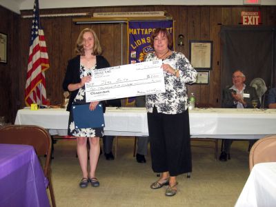 Top Student
Old Rochester Regional High School Class of 2010 valedictorian
Jean Smith, left, accepts a scholarship from the Mattapoisett Lions Club
president Helene Rose, right. Photo courtesy of Helene Rose.
