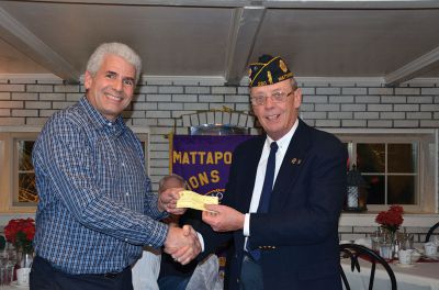 Mattapoisett Lions Club 
Mattapoisett Lions Club President Dom Bamberger, left, presents a check to Mike Lamoureux from the American Legion, right.  The Mattapoisett Lions Club has been raising money and serving the community since 1953.  Photo courtesy of Helene Rose. 

