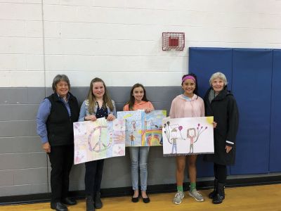 Lions International Peace Poster Contest
Participants in the 31st annual Lions International Peace Poster Contest were honored for their participation at the morning assembly at Old Hammondtown School on Friday, November 2. Shown here L-R: Mattapoisett Lion Helene Rose, second place winner Caitlin O’Donnell, third place winner Taylor Walsh, first place winner Caroline Brogioli, and Lions Club member Cindy Turse. Photo courtesy Helene Rose
