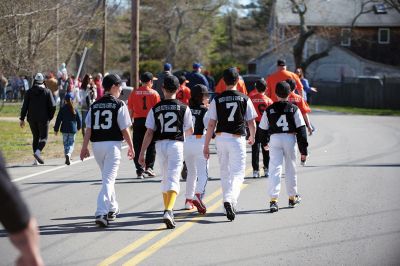 Old Rochester Little League
The Old Rochester Little League celebrated its Opening Day of the 2016 season on Saturday, April 30 at Gifford Park off Dexter Road in Rochester. The young athletes took part in the traditional Opening Day parade, which began at Dexter Park and concluded at Dexter Field. The players then circled the field for the National Anthem, with a flyover by Glenn Lawrence in his plane. After opening ceremonies, the first games of the season were held. Photo by Colin Veitch
