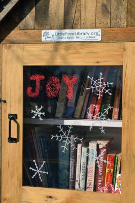 Little Library
This Little Library on River Road in Mattapoisett is all decked out for the holidays, and it includes Christmas-themed books, candy canes, and dog treats. Photo by Jean Perry

