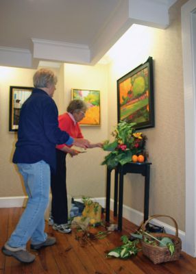 Art in Bloom
The Marion Art Center’s Art in Bloom opened on Friday, organizers and volunteers gathered Friday afternoon to prepare the exhibit. Works by Mary Jane McCoy and Arthur Kvarnstrom will be paired with interpretative floral arrangements by members of the Marion Garden Discussion Group. Art in Bloom runs through July 13. The Marion Art Center Gallery is open on Tuesday through Friday from 1:00 pm to 5:00 pm, and on Saturdays from 10:00 am until 2:00 pm. Photo by Shawn Badgley
