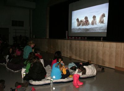 Family Movie Night
Rochester Memorial School Speech/ Language instructor Darbi Lambert-Matos along with her walking partner Jennifer DaCosta hosted a 'Movie Night' fundraiser at RMS on Friday evening January 20, benefitting the Susan G. Komen for the Cure Fund for the prevention and cure for breast cancer. The night's movie was the Disney feature ‘Snow Buddies’ with the event taking place in the school’s cafetorium. Photo by Robert Chiarito
