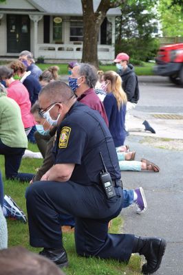 Kneel for Nine
A peaceful crowd gathered on the lawn of the Marion Music Hall on June 2 to kneel in solidarity for nine minutes calling for justice for the death of George Floyd and accountability for police brutality. Marion Police Chief John Garcia dressed in his police uniform was among the roughly 200 kneeling on the grass that afternoon. Photos by Jean Perry
