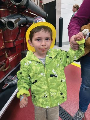 Mattapoisett’s Fire Department
Mattapoisett’s Fire Department opened its doors to the community on October 12 with a grand party filled with family, friends and pizza. The event was an opportunity for the department to highlight fire prevention while tiny tots donned helmets and rang the bell on an antique fire engine. “It’s a great success,” said Chief Andrew Murray of the event that hosted several hundred people of all ages. New Fire Engine Number 3 was on display having just a day before been added to the fleet. 
