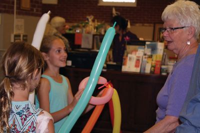 Balloon Fun
The Mattapoisett Library welcomed the balloon-bending artist Chip Rascal to help kick off the library’s summer reading program. Rascal used balloons to create a small-scale replica of Salty the Seahorse, and he also shared his tricks of the trade with library patrons to explore balloon art. Photos by Jean Perry
