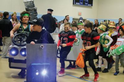 Annual Halloween Costume Contest 
The Mattapoisett Police Department’s Annual Halloween Costume Contest had spectators spinning in circles as the most creative than ever costumes paraded around the Center School gymnasium Thursday night. The costumes were such a hit, even the judges had a hard time choosing the winners of each age group. Photos by Jean Perry
