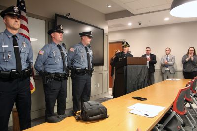 Mattapoisett Police Department
Robert Randall was sworn in as Sergeant with the Mattapoisett Police Department, and three, new full-time officers, from left: Louis DaSilva, Matthew Bates and Aaron Myers, were introduced during a special meeting of the Select Board on Monday at the fire station. Chief of Police Jason King welcomed the new officers, and Randall was sworn in by Town Clerk Catherine Heuberger. Randall’s daughter Madelyn, 9, applied his pin, as his son Beau, 8, looked on. Photos by Mick Colageo
