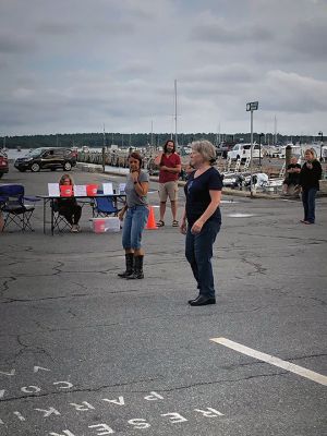 Boot Scootin’ 
The Friends of the Mattapoisett Council on Aging sponsored their second Boot Scootin’ Line Dance class on the wharves of Shipyard Park on Thursday August 11. Photo by Marilou Newell
